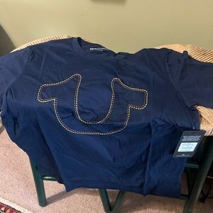 T-shirt blue in color new with tags!!!